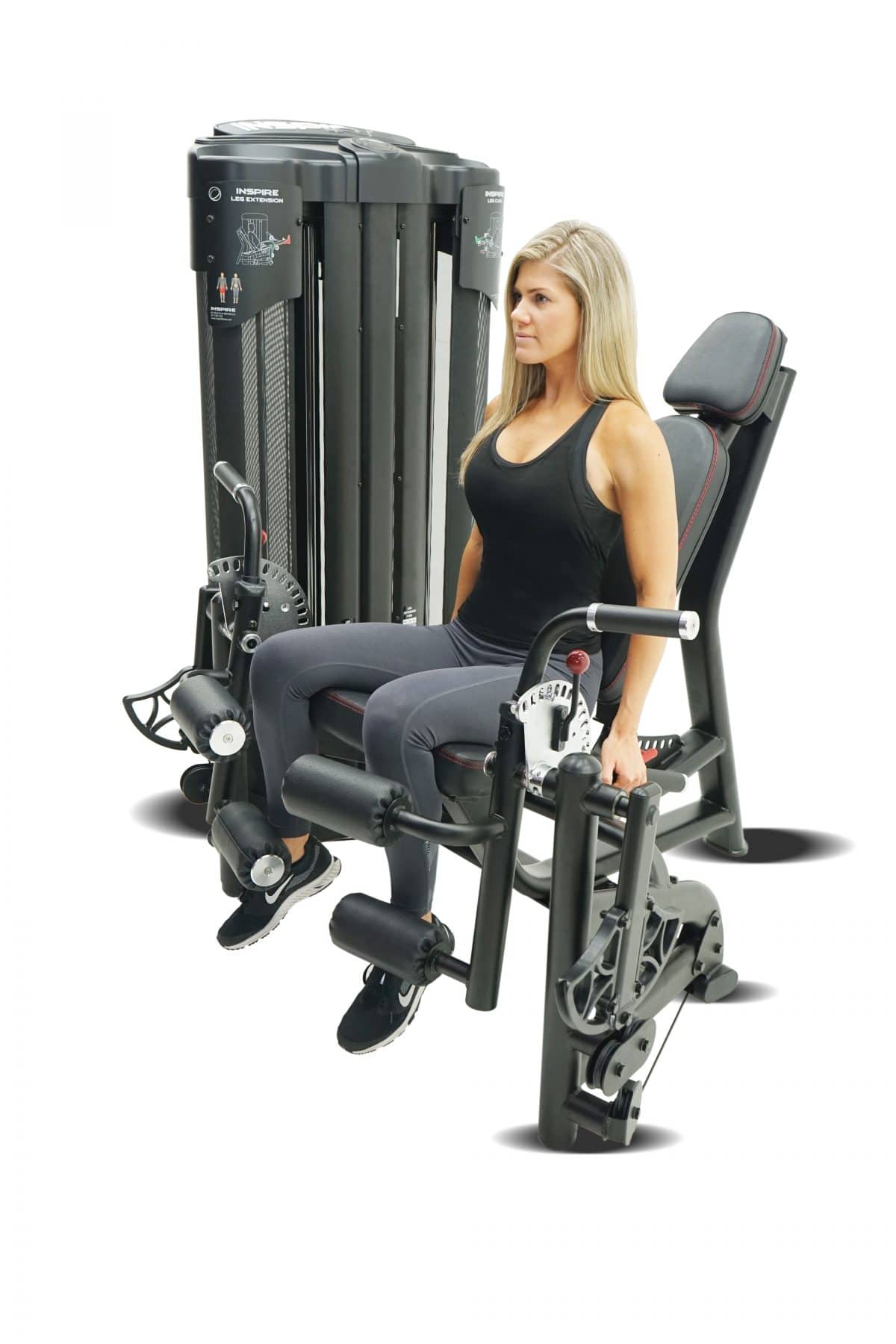 A woman sitting on an exercise machine.