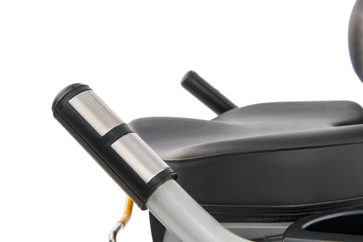 A close up of a motorcycle seat with a handlebar