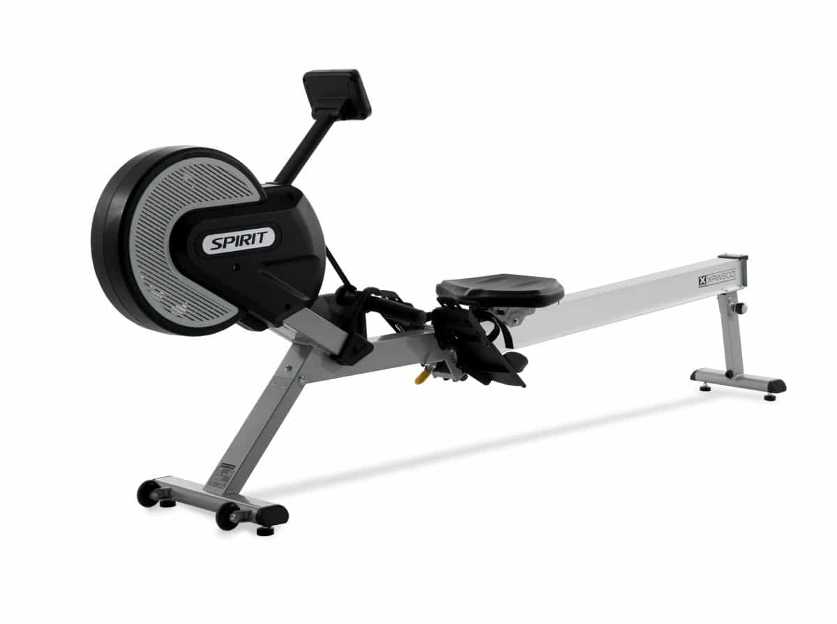 A rowing machine with a seat on a white background
