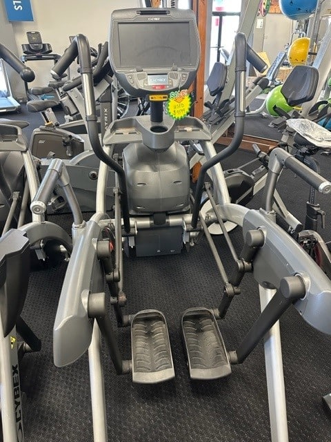 Elliptical exercise machines in a gym.